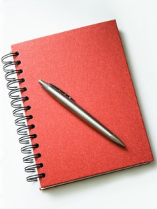 Red Notebook and Pen